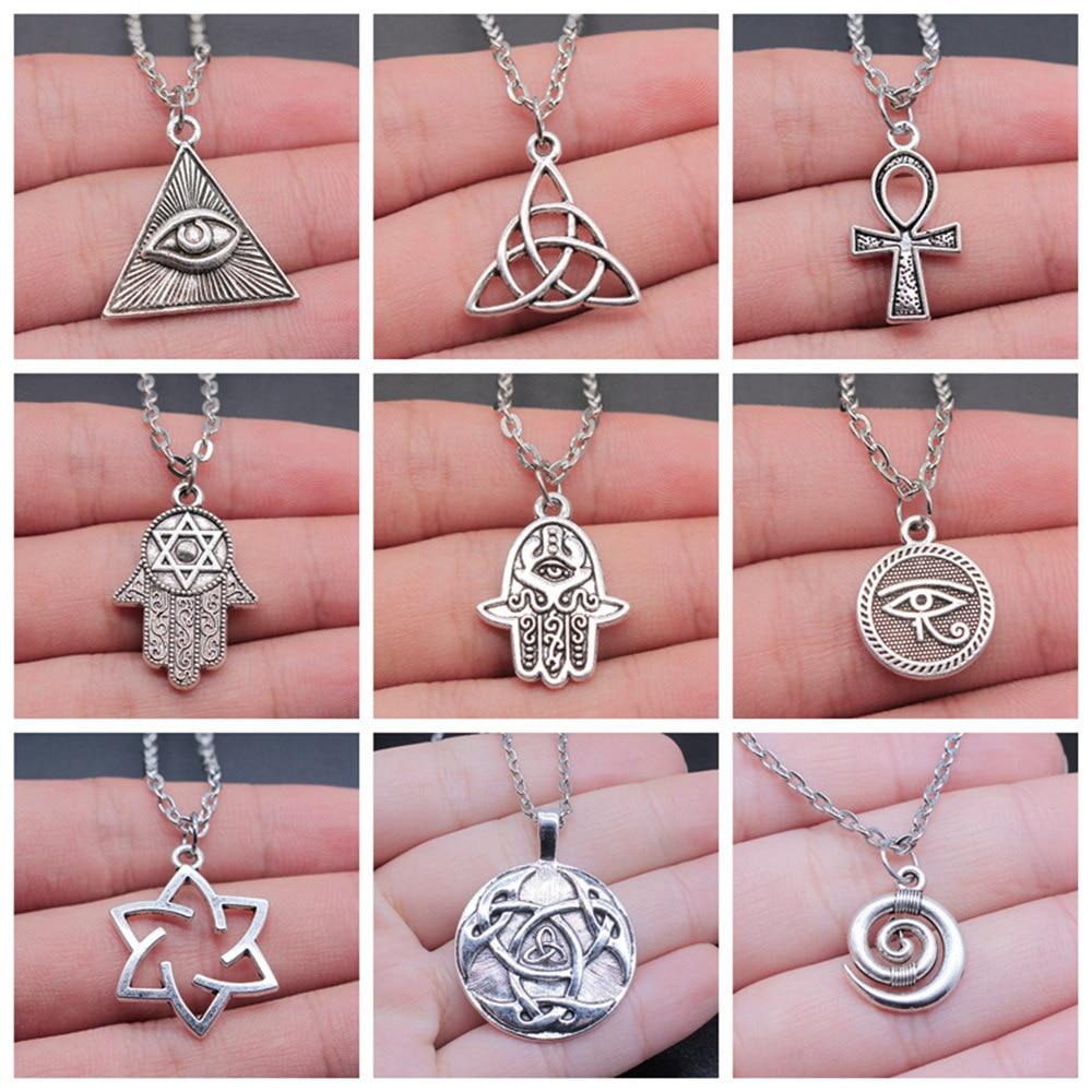 Colgantes amuleto en plata.